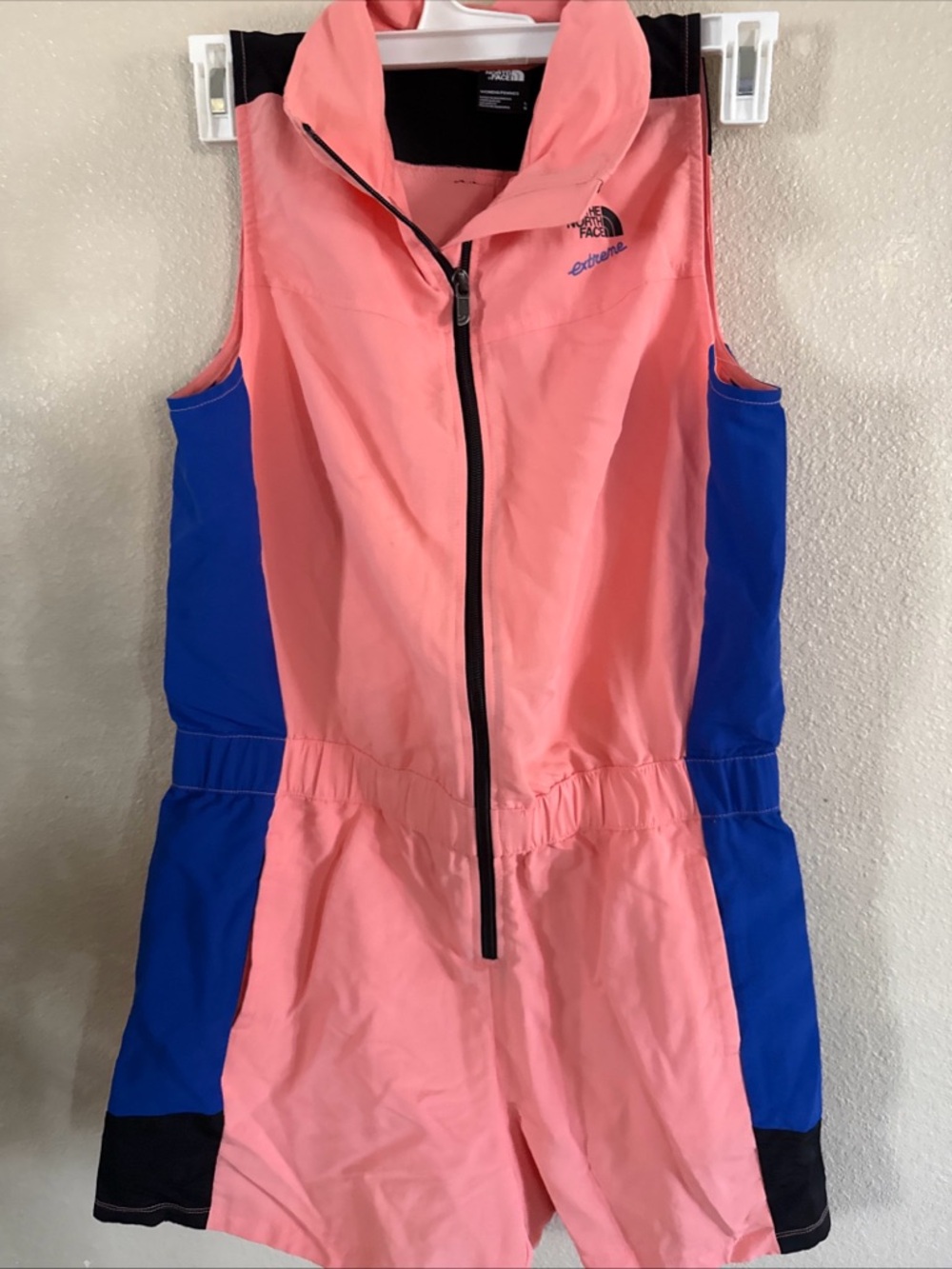 The North Face Coral Pink Jacket with Blue Script Logo